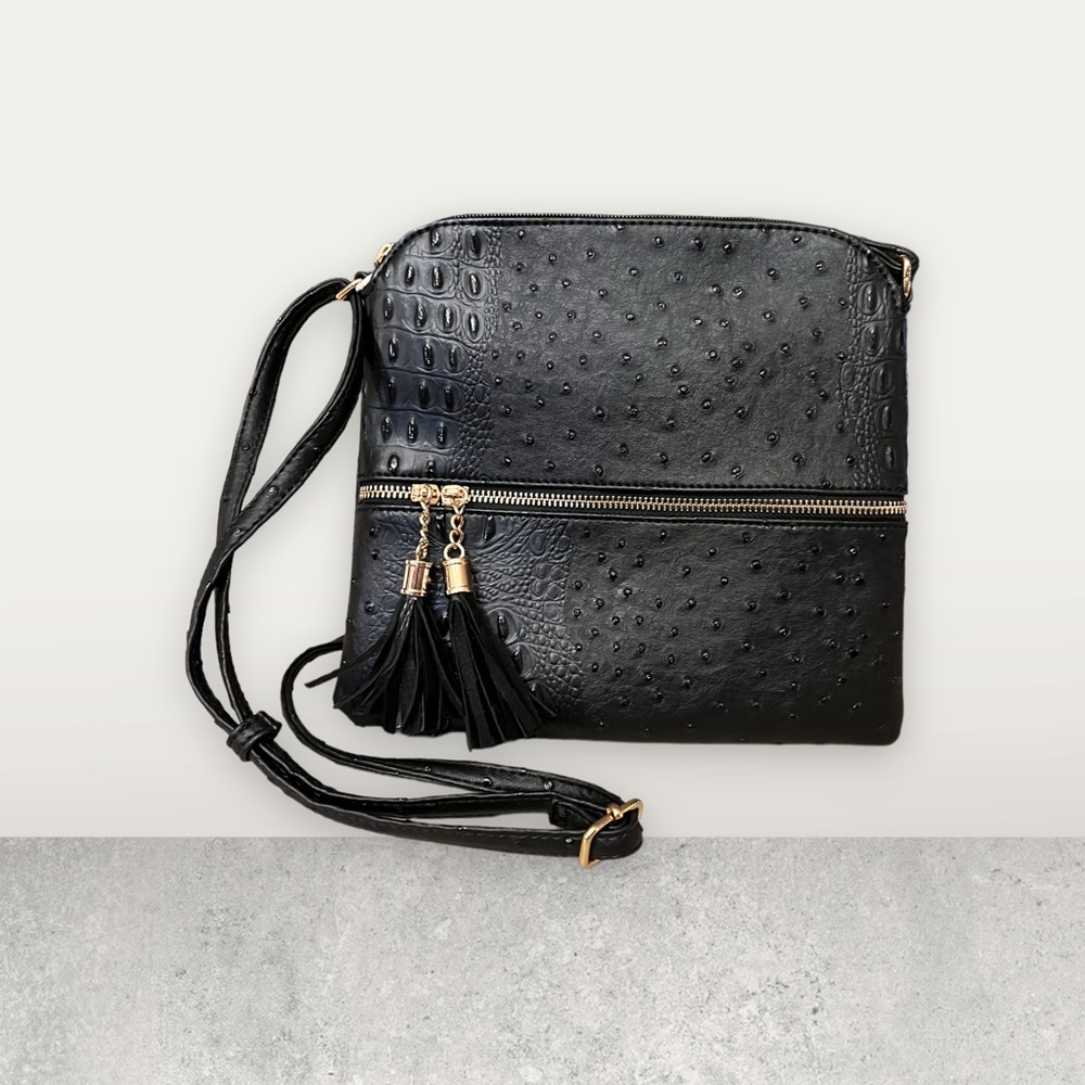 Crossbody bag in black color. Lead free and Vegab. Great looking bag.